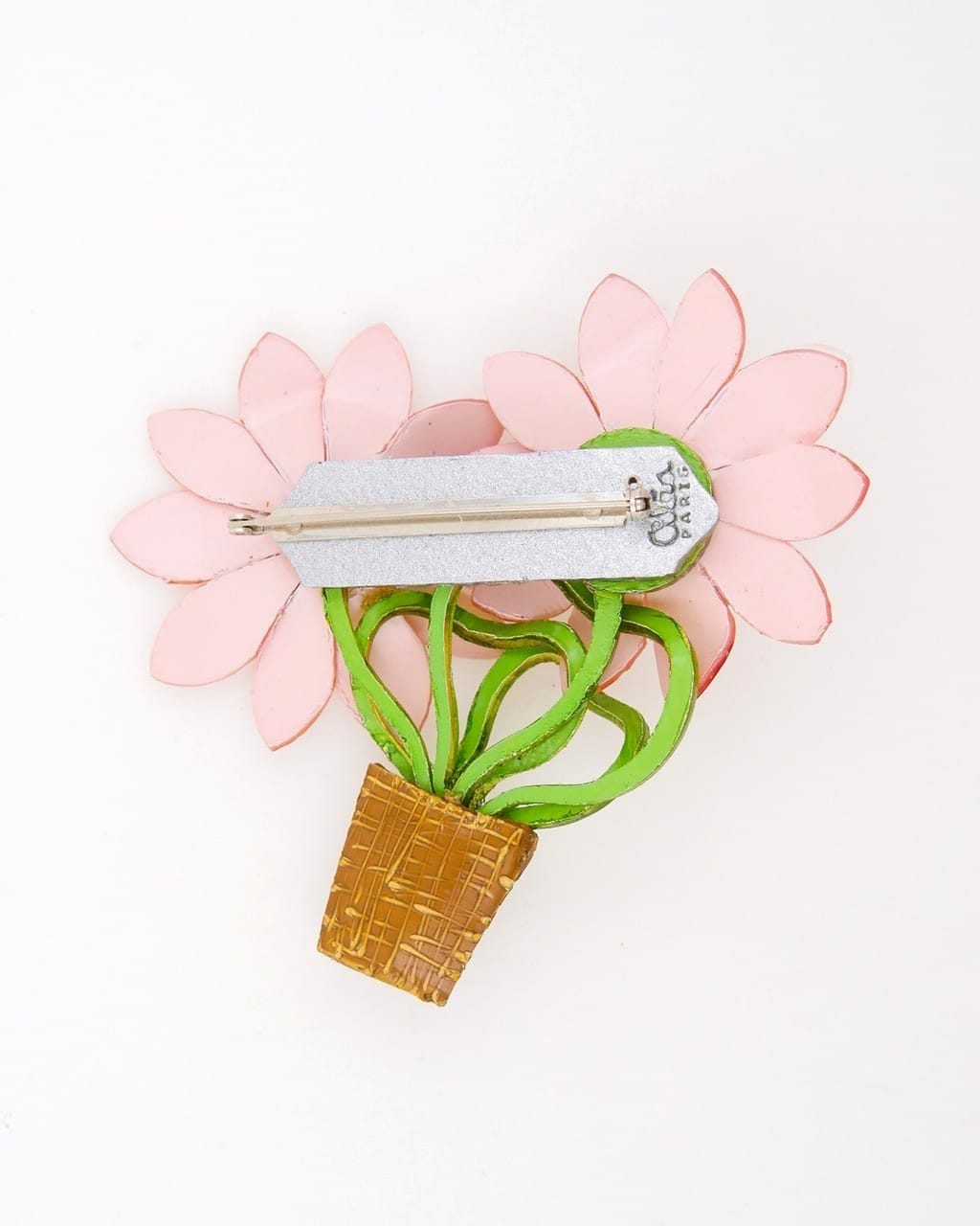 all-groups broche jardin représentant des plants rose vue de dos