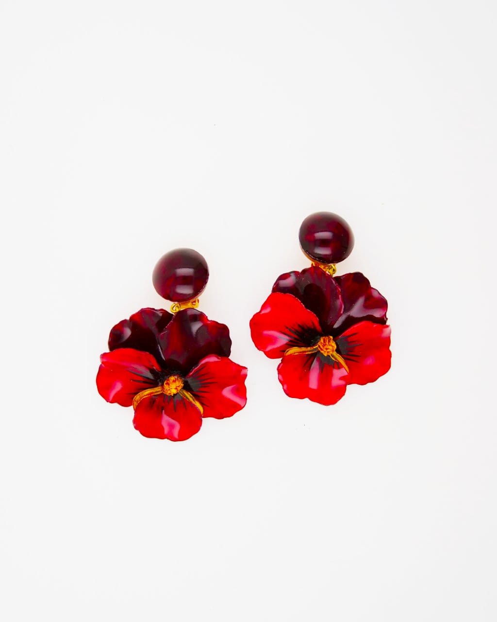 all-groups cette paire de boucle d'oreille pendante est d'un rouge intense et profond pour un maximum de signification