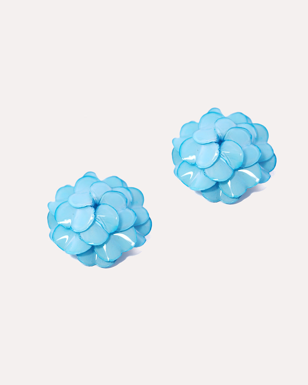 Boucle d'oreille fleur bleue