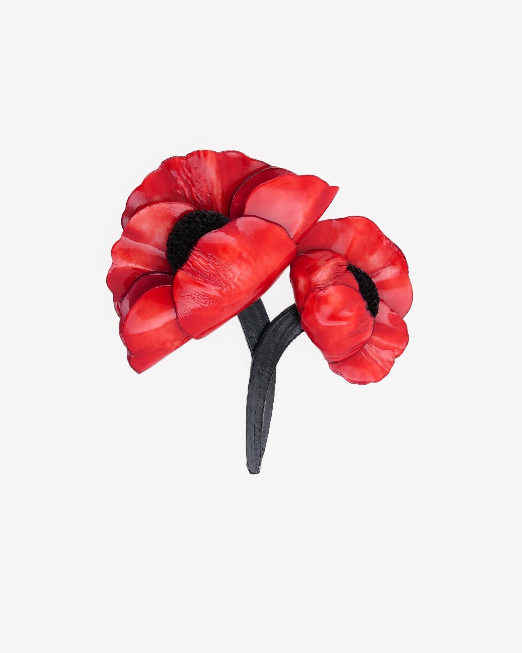 Broche bijou fleurie de couleur rouge