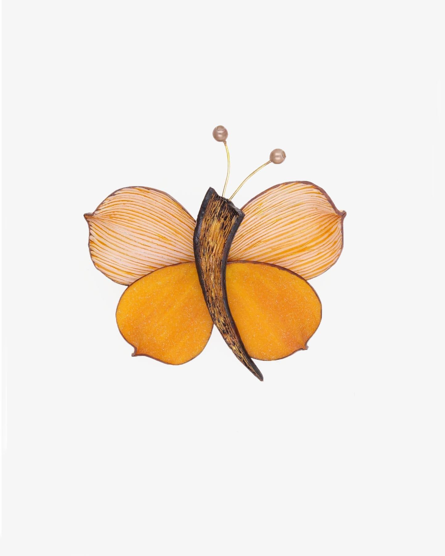 Broche papillon de couleur orange effet velours