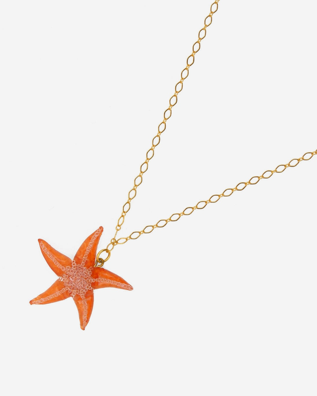 pendentif etoile de mer orange, collier ariel et chaîne dorée
