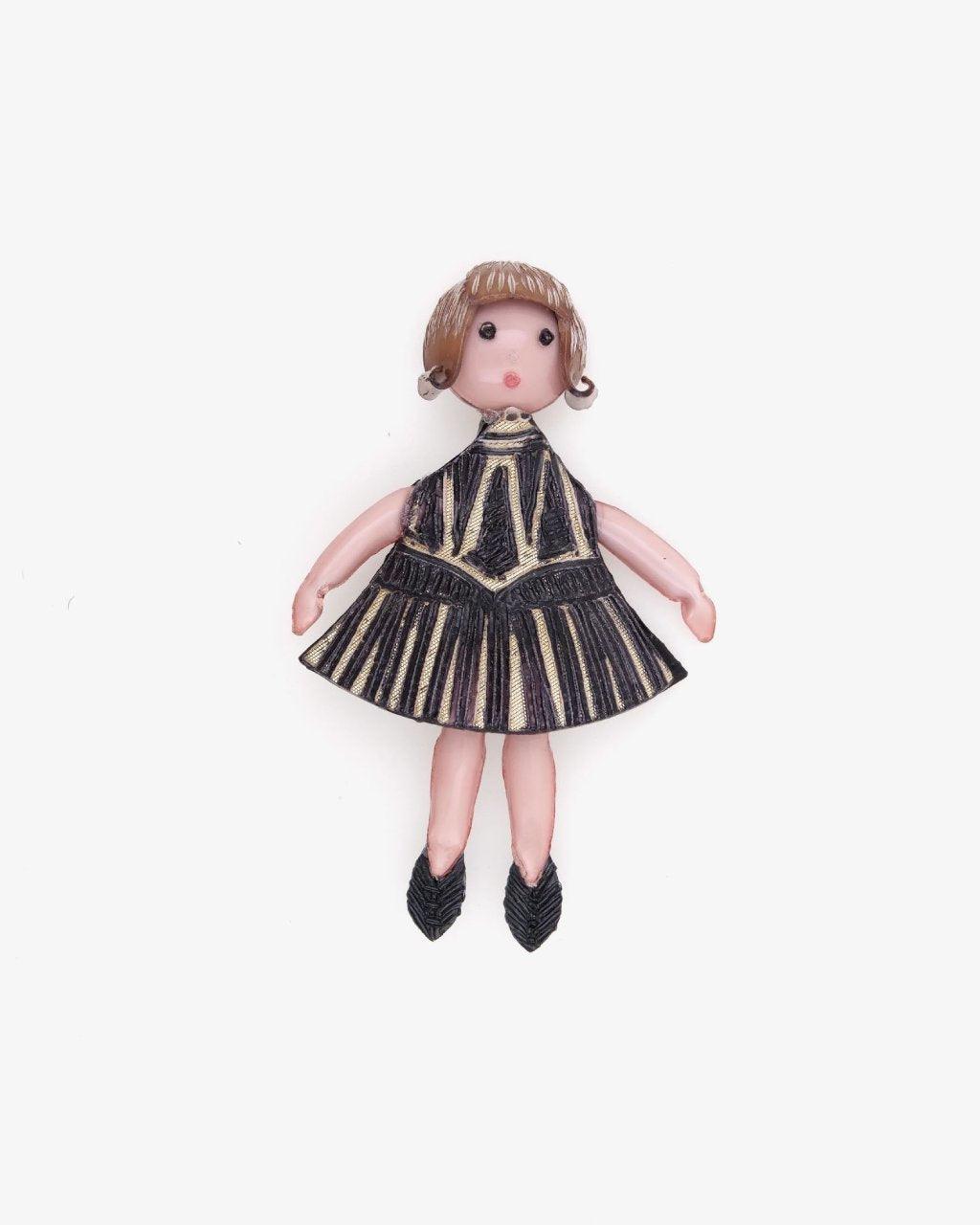 Broche petite fille dans notre magasin fantaisie de couleur noire et dorée