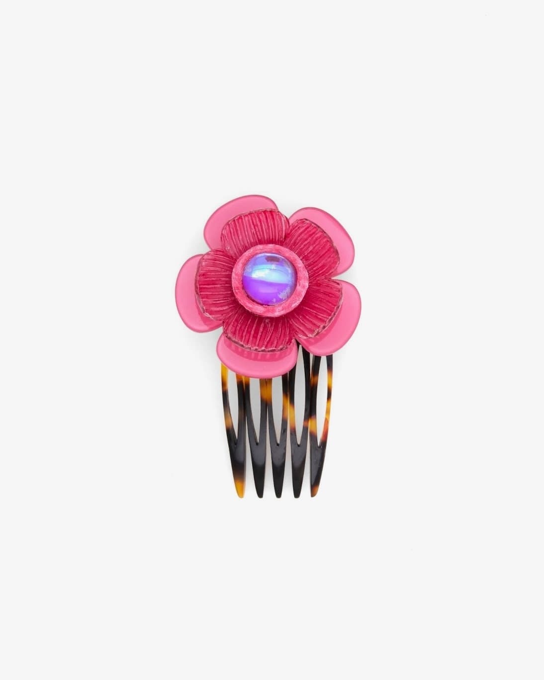la couleur rose représente la passion sur cet accessoire cheveux pour femme