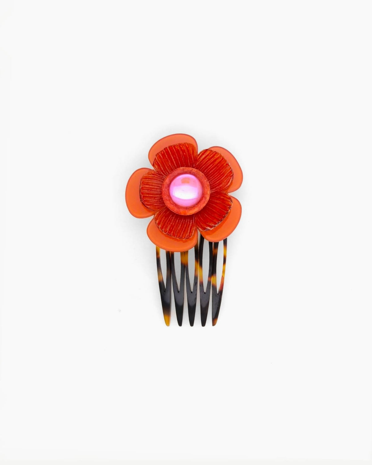 orange, une couleur de coucher de soleil sur un petit accessoire cheveux original