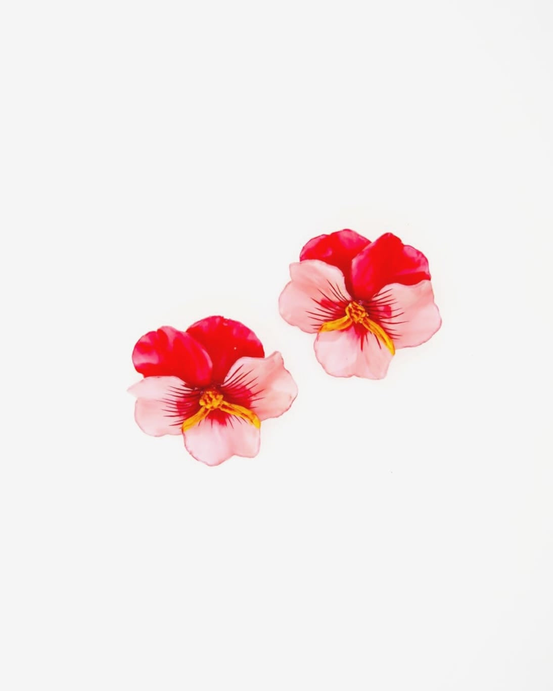 cette boucle d'oreille viola est rouge et rose pour femme