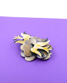 all-groups bijou tendance pour femme broche oiseau Cabourg sur fond violet