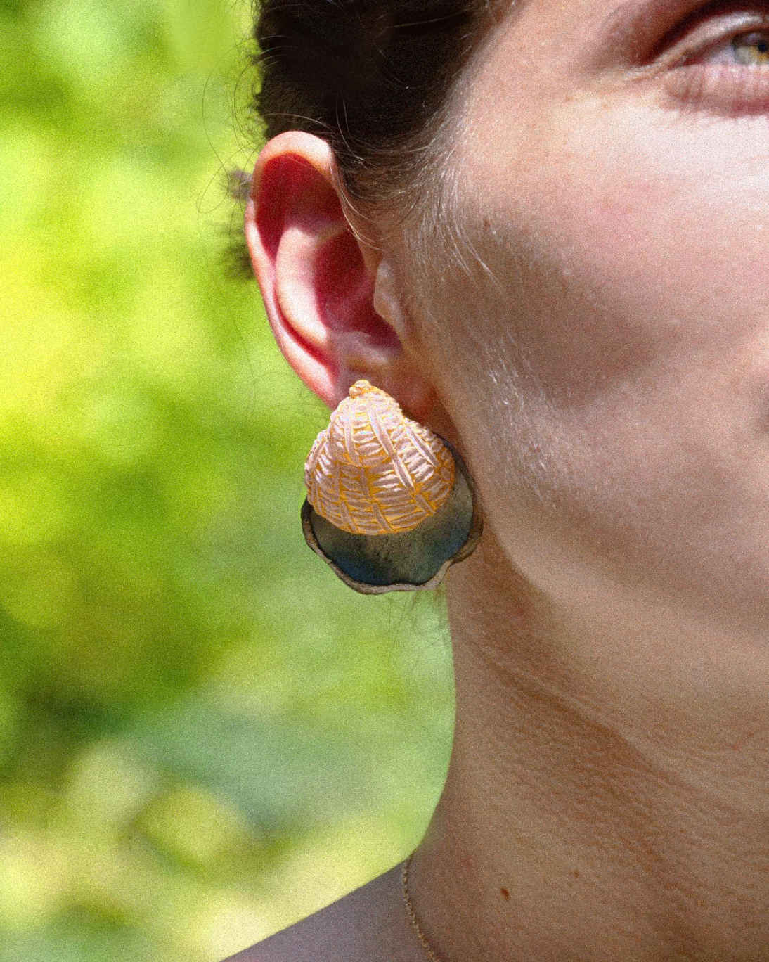 Bijou tendance coquillage porté all-groups