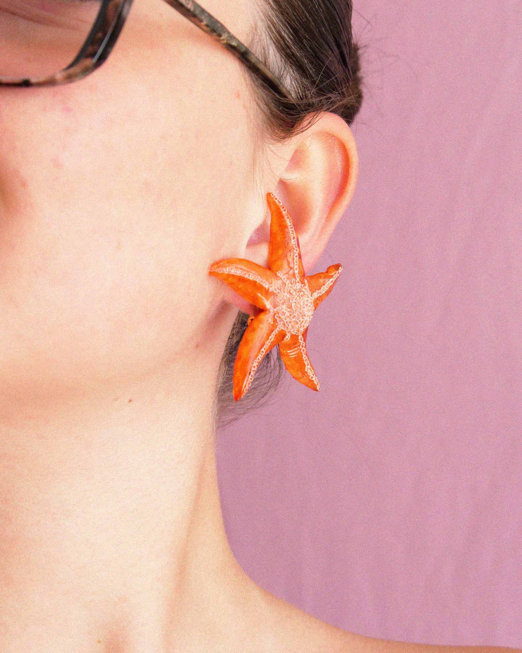 All-groups Boucles d'oreilles artisanales étoiles de mer oranges 