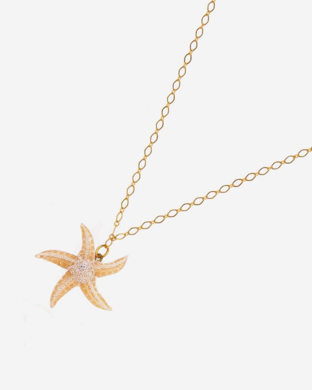 pendentif en frome d'etoile de mer, un collier artisanal 