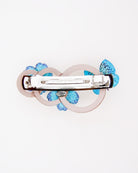 all-groups barrette pour cheveux originale bleue avec deux fleurs et un papillon unique vue de dos